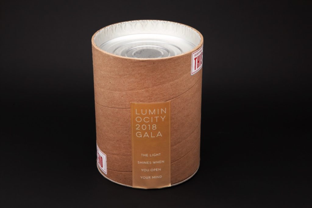 Museum of Contemporary Art Denver Luminocity Gala mailer container designed by EBD.