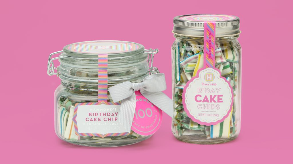 Hammond's Birthday Candy Chips Jar designed by EBD against a pink background.