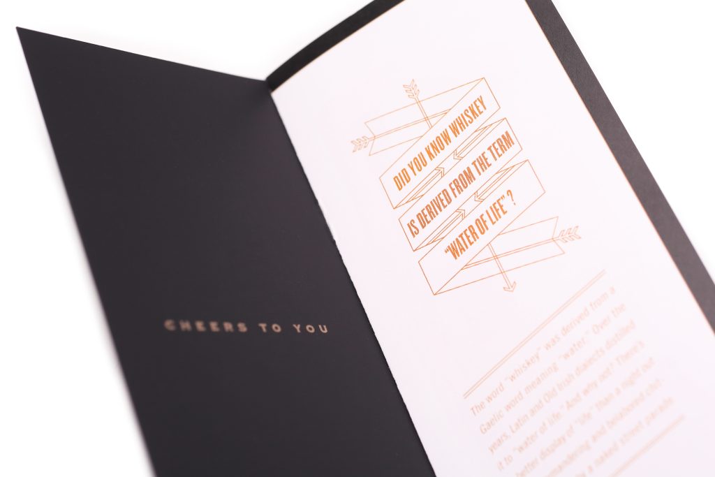 A folding pamphlet with cocktail recipes using Branch and Barrel Whiskey designed by EBD.