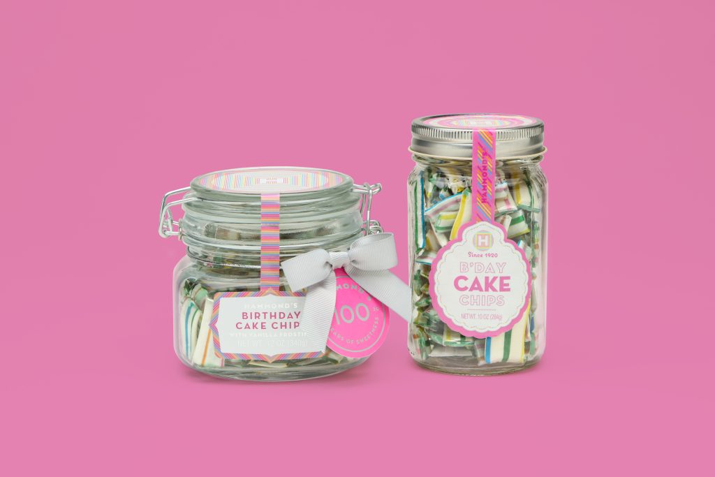 Two different sized jars designed by EBD containing Hammond's Birthday Cake Chips to celebrate 100 years.