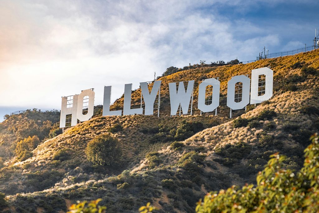 The iconic Hollywood sign in California on a sunny day.